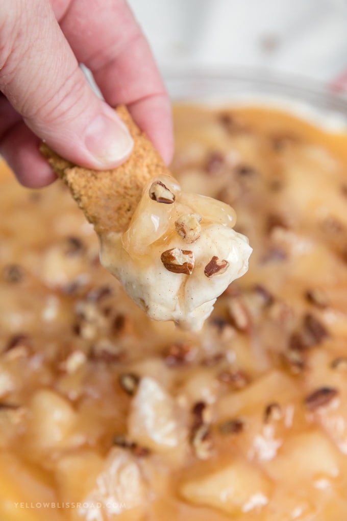 Caramel Apple Pie Cheesecake Dip on a graham cracker.