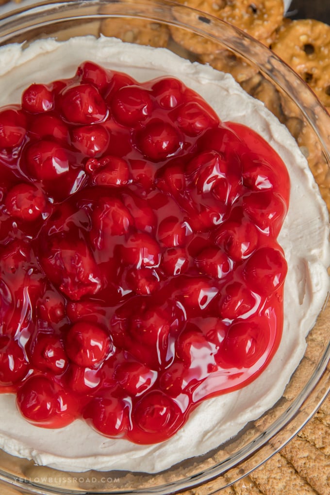 No Bake Cherry Cheesecake Dip is a yummy dessert for any occasion. Made with a sweet cream cheese base and cherry pie topping. No Bake Cherry Cheesecake Dip Recipe