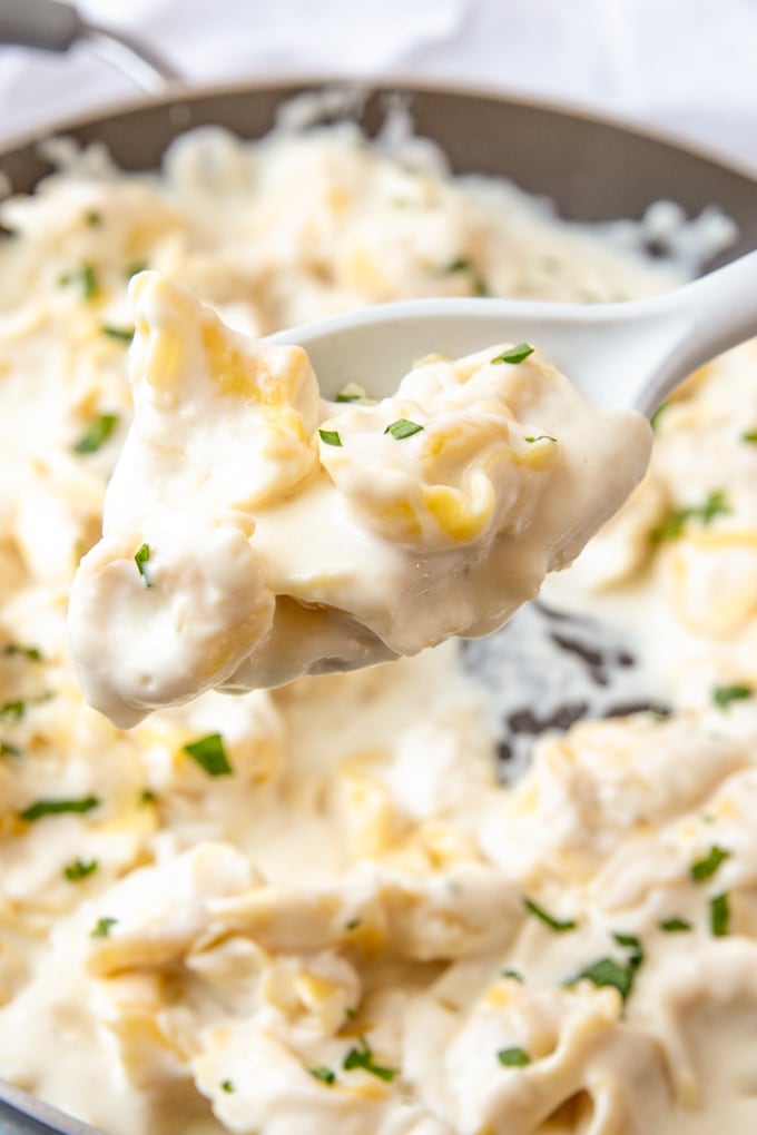 Garlic Parmesan Tortellini on a spoon.