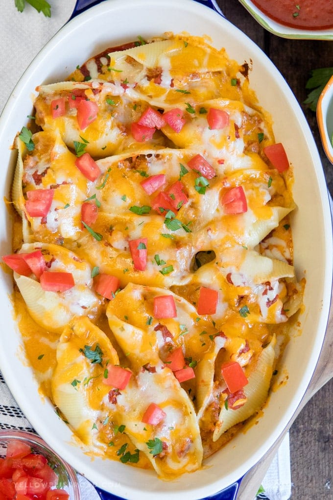 An overhead shot of ground turkey taco stuffed shells.