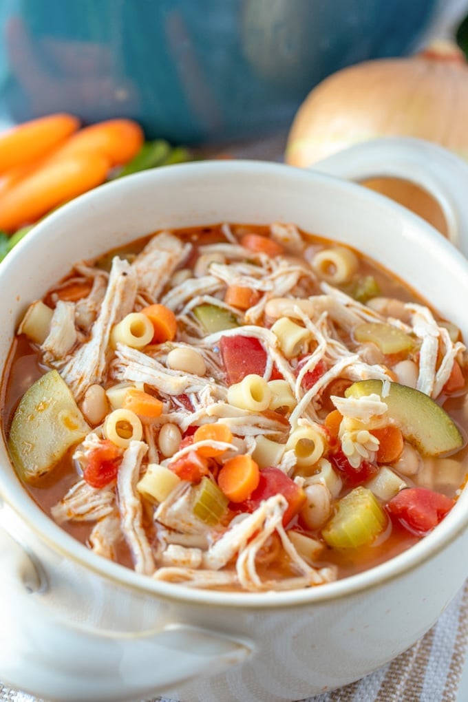 A bowl of chicken minestrone soup.