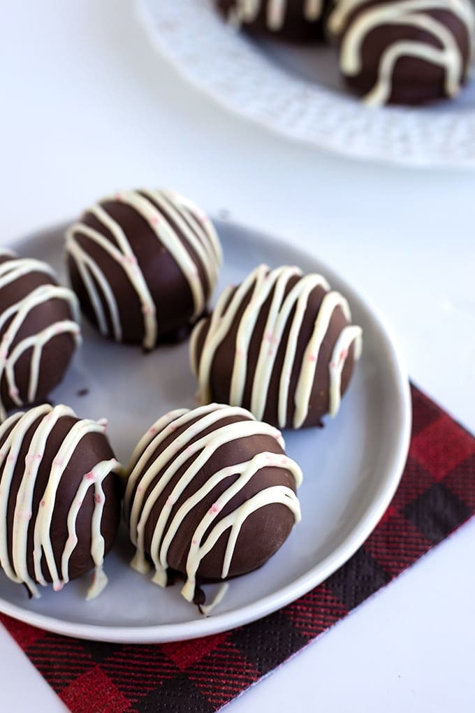 Peppermint oreo truffles on a white plate
