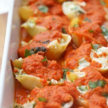 close up of stuffed shells in a pan after baking