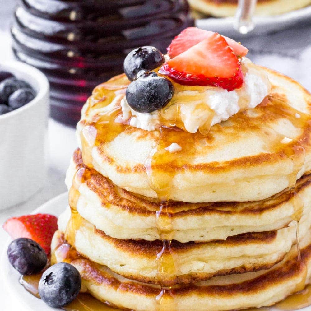 These easy Greek yogurt pancakes are the perfect homemade pancake recipe. Light, fluffy, slightly tangy, and perfect for stacking - they taste amazing with maple syrup!