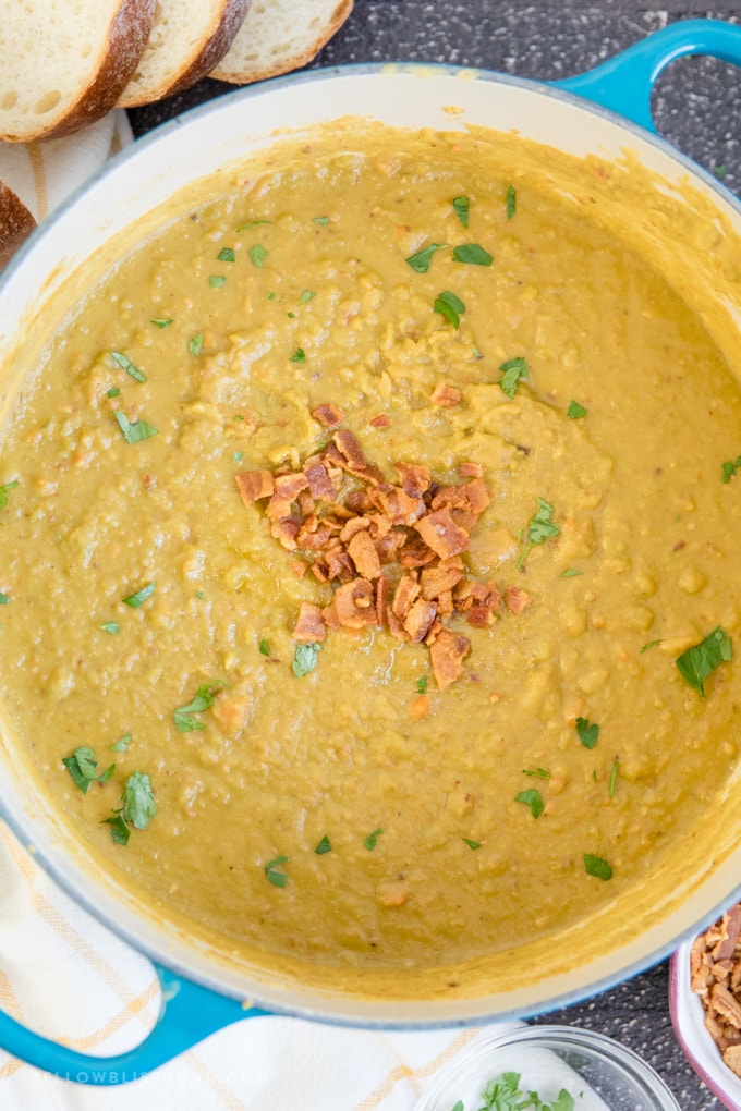 This Split Pea Soup Recipe with Bacon has a thick and creamy, split pea base, loaded with veggies, seasonings and tons of crunchy, salty bacon. A large pot of Split Pea Soup Recipe with Bacon.