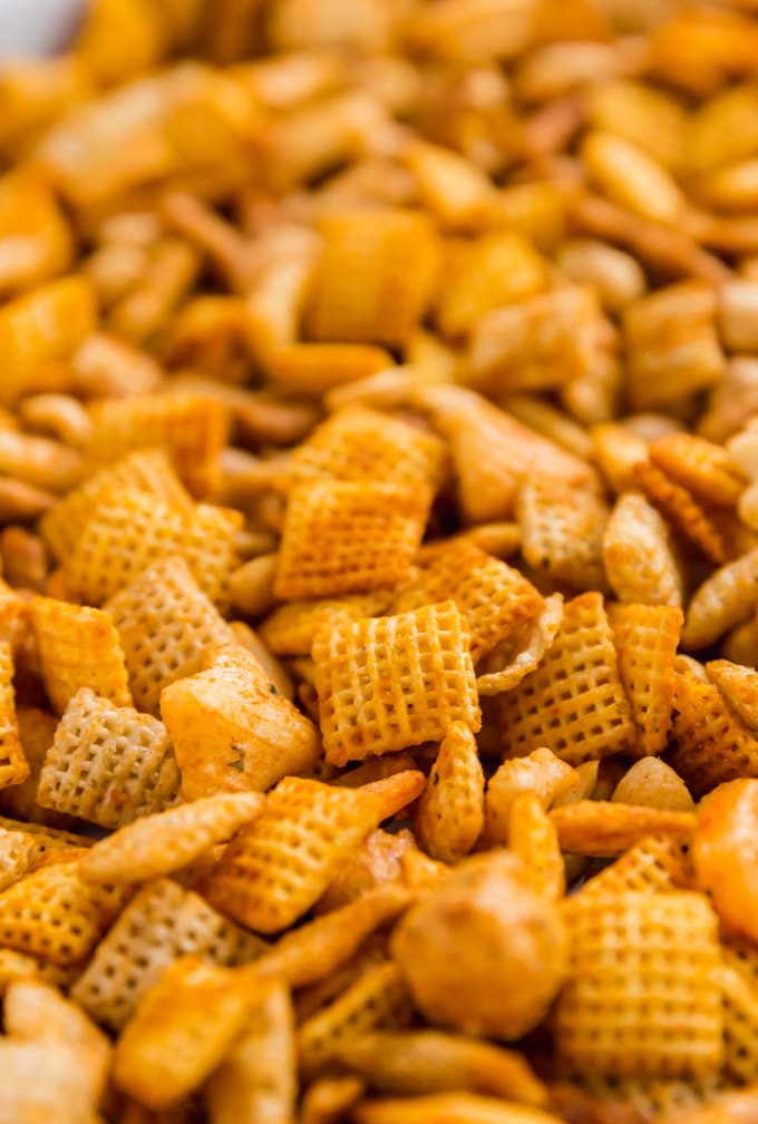 A close up of a pan of Sriracha Chex Mix