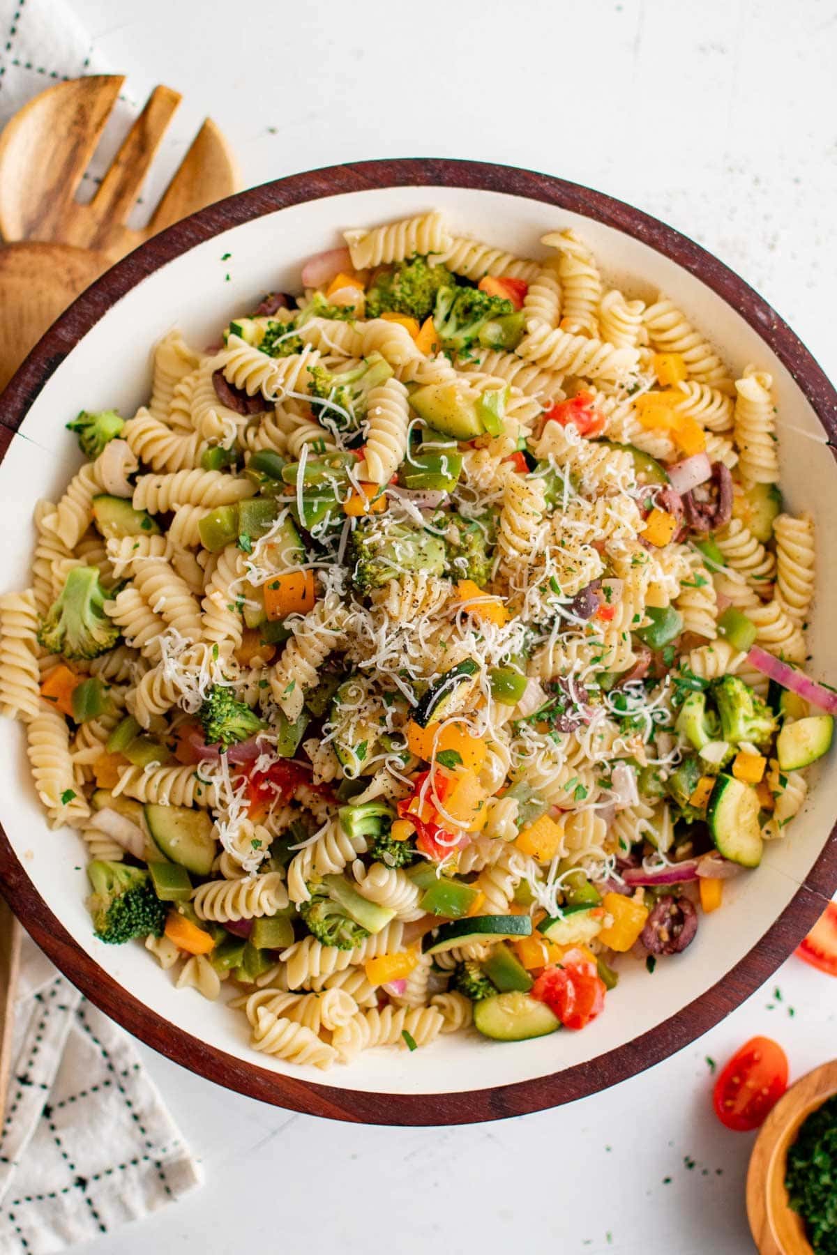 Vegetables and rotini pasta in a large bowl.