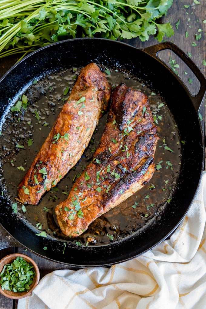 This easy Cajun Pork Tenderloin is the perfect main attraction for any dinner and a simple 2-step process guarantees a tender, juicy bite every time. An overhead shot of two whole pork tenderloins
