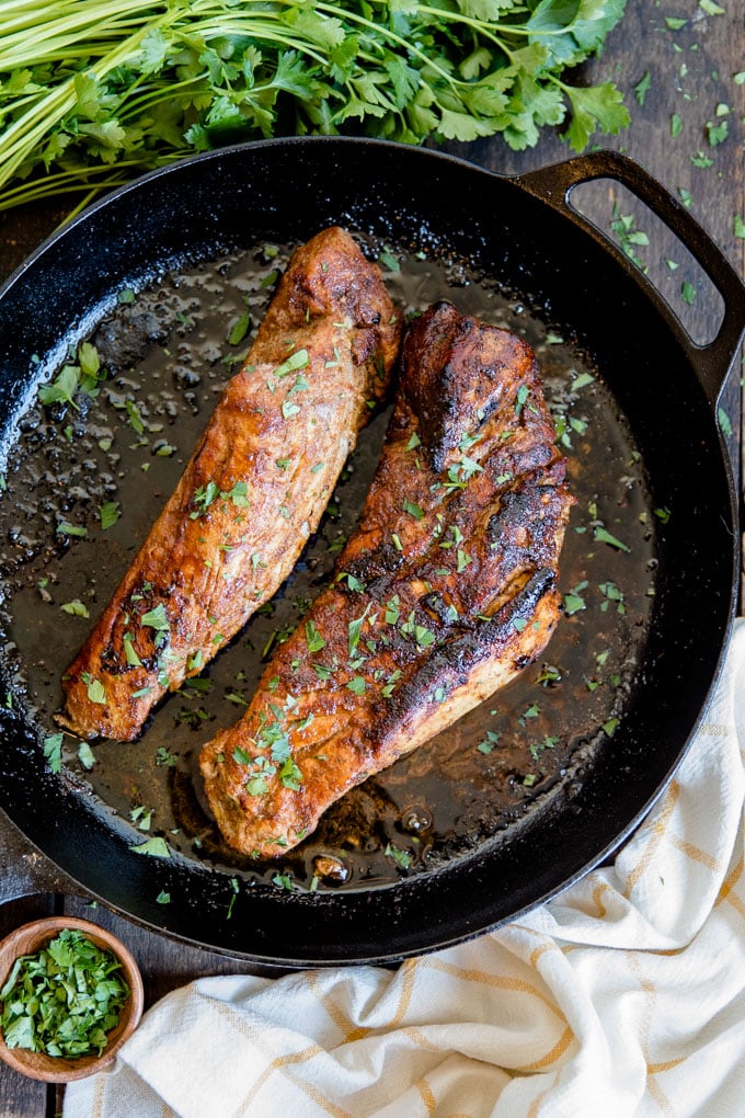 An overhead shot of two whole pork tenderloins