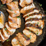 Pan with sliced Cajun pork tenderloin