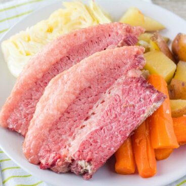 There's nothing I love better on St. Patrick's Day than a big platter filled with my favorite Corned Beef and Cabbage Recipe!