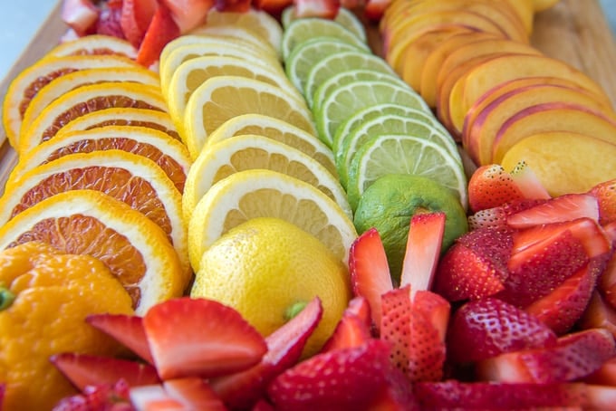 Cut up Oranges, strawberries, limes and lemons