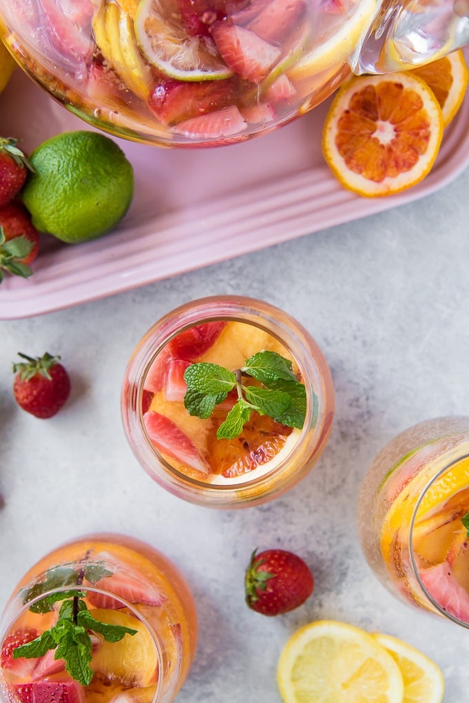 An overhead shot of white sangria in glassees