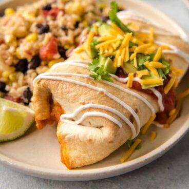 A plate of Chimichangas and rice