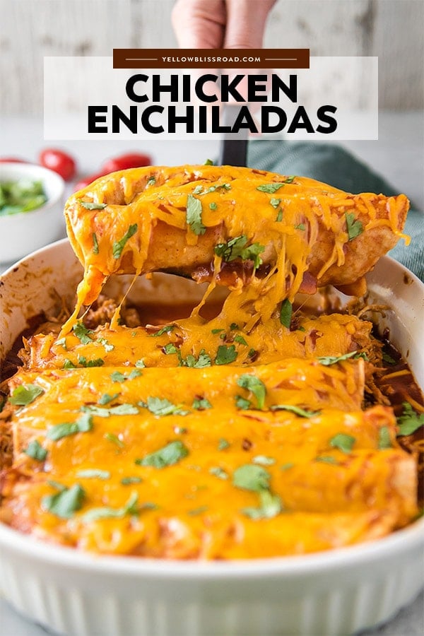 Chicken Enchiladas lifted out of the pan with a spatula. Also with title text.