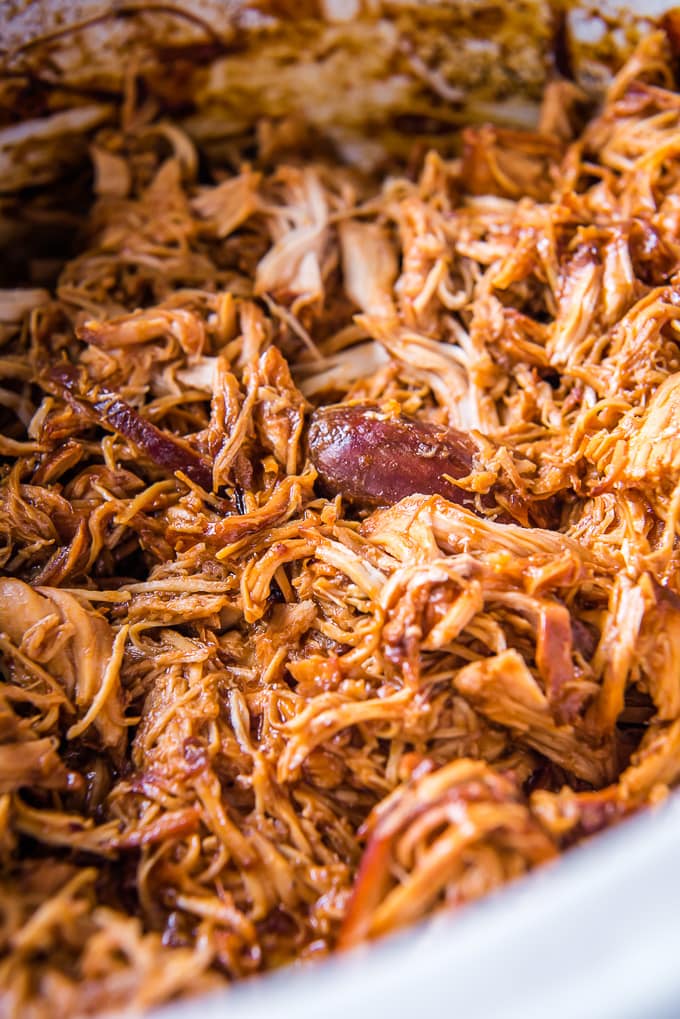 A crockpot filled with bbq chicken