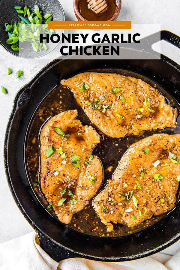 Honey garlic chicken in a large skillet with title text overlay