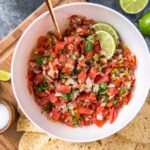 A bowl of Pico de Gallo and tortilla chips