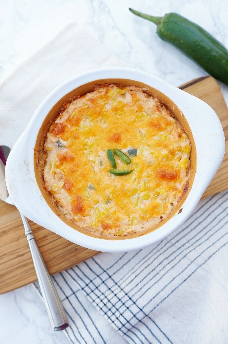 This Jalapeno Cheddar Corn Casserole is a delicious way to serve corn as a side dish with dinner! Filled with spicy jalapenos, creamy cheese and crisp corn. Jalapeno Corn Casserole