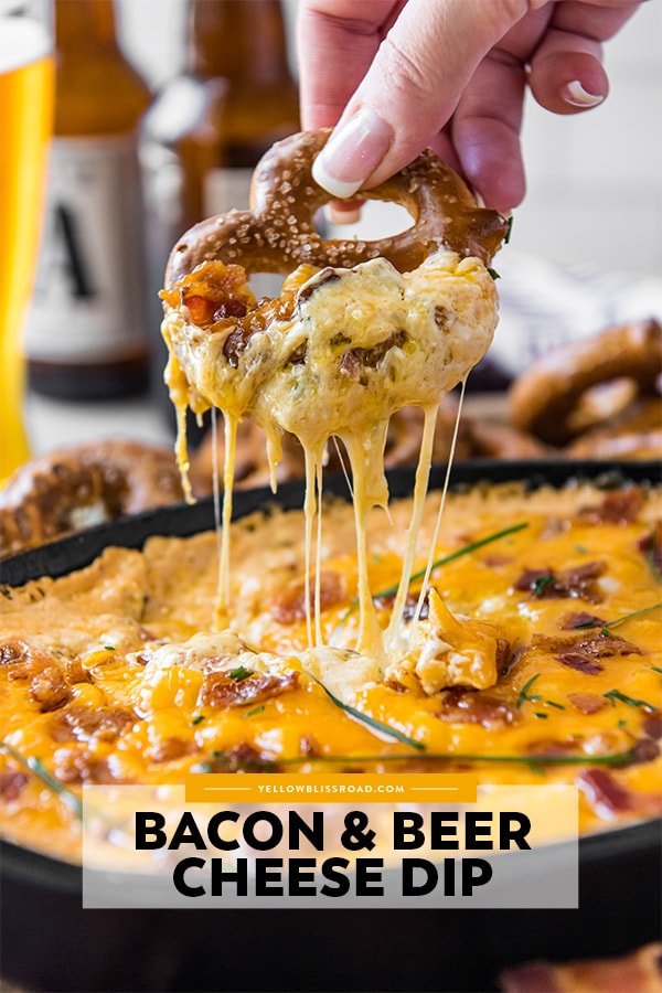 A pinterest friendly image of a pretzel dripping with beer cheese dip