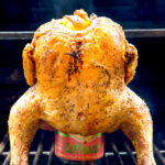 Social media image of whole chicken on a beer can on a grill
