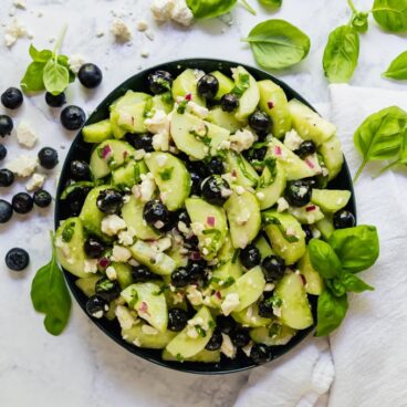 An overhead image of a bowl of this cucumber salad recipe