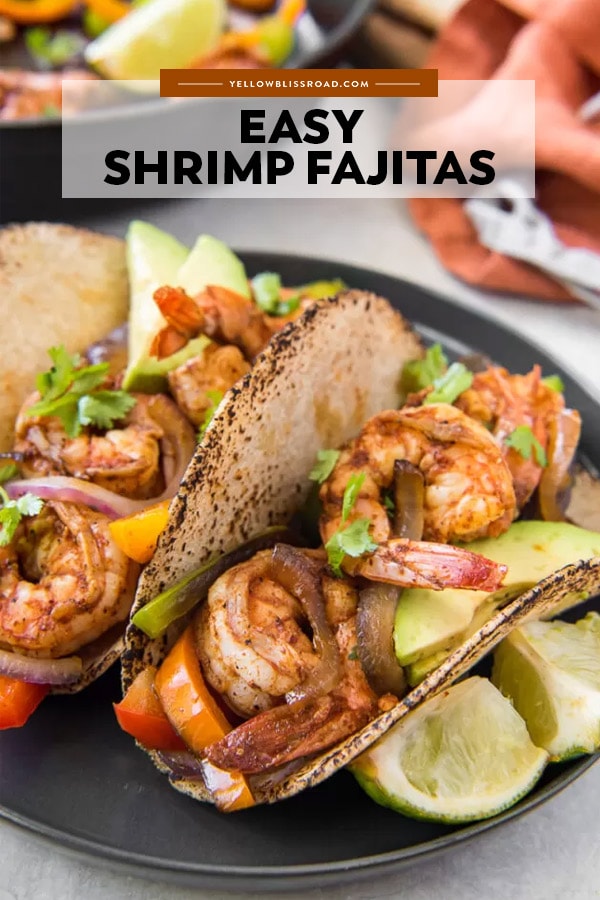 A pinterest friendly image of shrimp fajitas with title text overlay.
