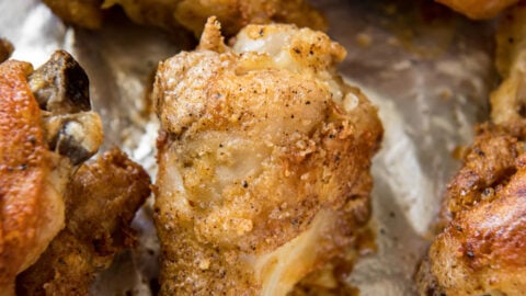 baked crispy wings on a baking sheet