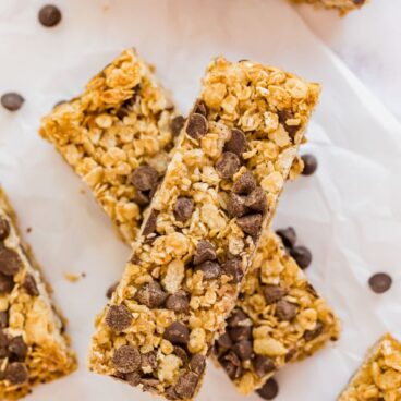 An overhead image of a stack of granola bars with chocolate chips