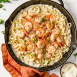 Social media image of Shrimp Alfredo in a pan