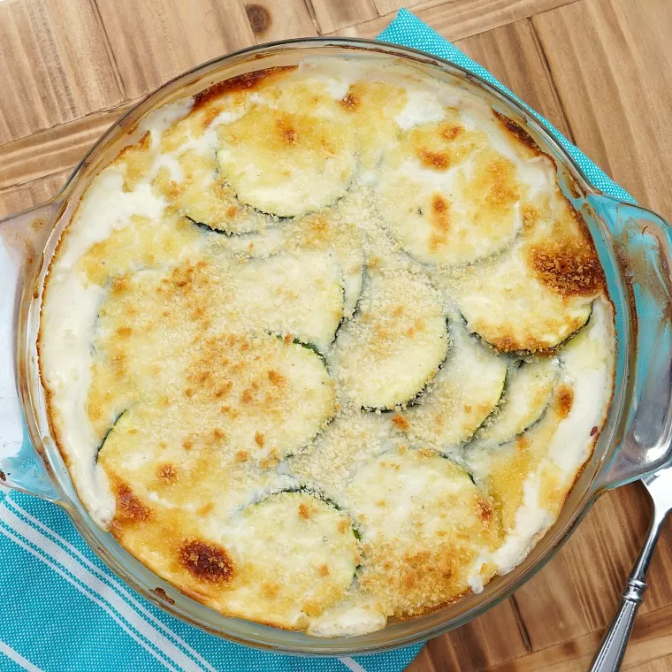 An overhead image of a zucchini casserole with golden bread crumbs