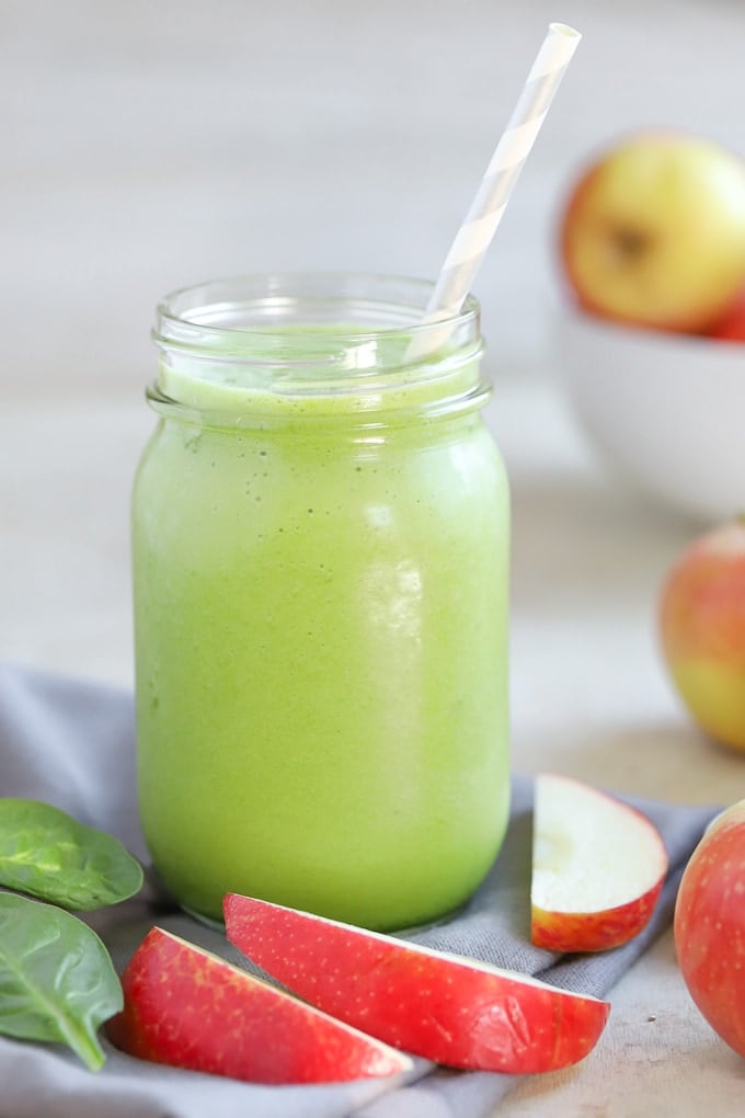 A green smoothie in a mason jar.