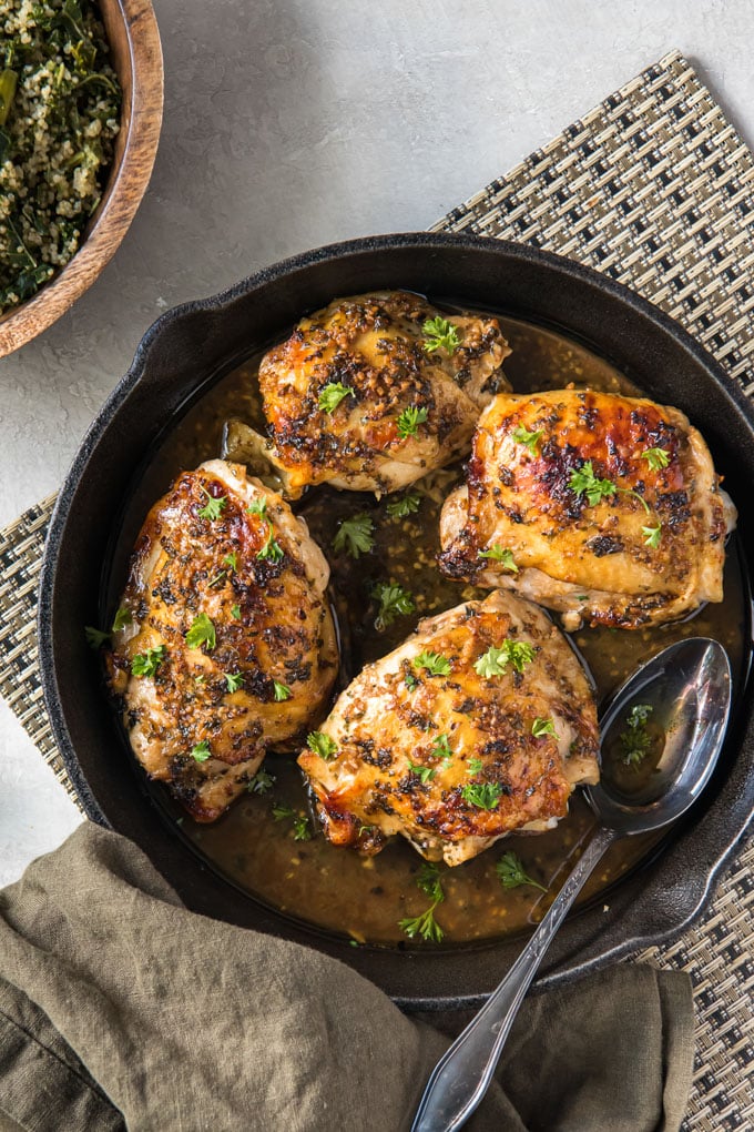 chicken thighs in a cast iron skillet