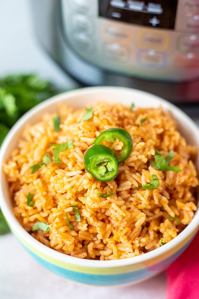 Bowl of Instant Pot Mexican Rice with jalapenos on top