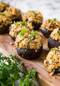Stuffed mushrooms with breadcrumbs and parsley. Social media image.
