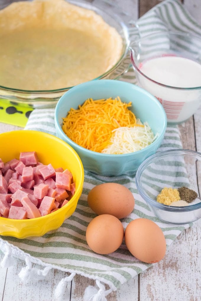 Ham and Cheese Quiche recipe is my go-to for brunch or holiday breakfast with the family. Incredibly easy to make and always a hit at breakfast! ham and cheese quiche ingredients