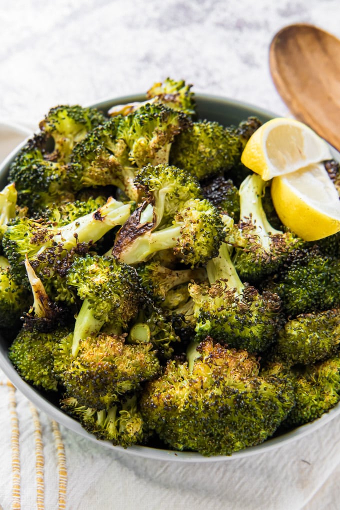 A large bull full of broccoli that's been roasted in the oven.