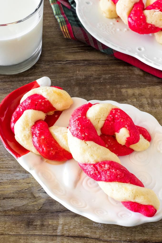 A plate of 2 candy cane cookies