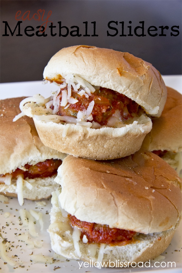 Meatballs on slider buns with sauce and cheese