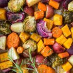A close up of many different roasted vegetables.