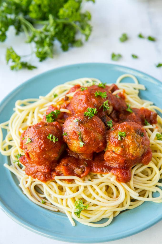 serving chicken meatballs with pasta and sauce