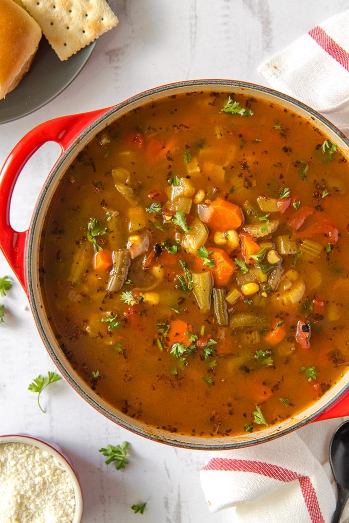 Premium Photo  Healthy homemade vegetable soup fresh and ready to eat - on  wooden table, parmesan cheese