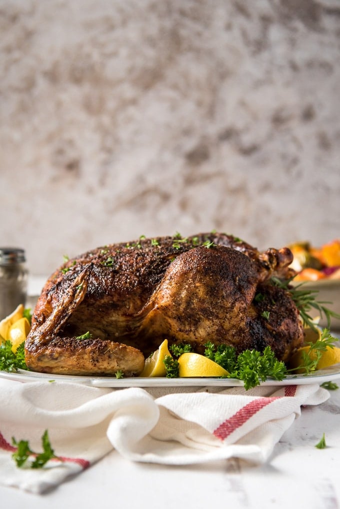 a side view of a whole roast chicken