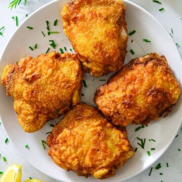 A plate of fried chicken thighs