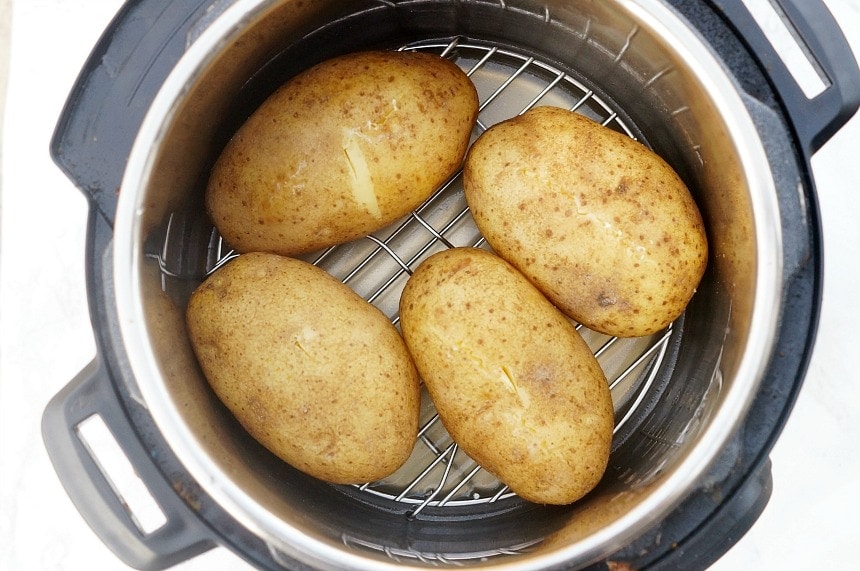 4 russet potatoes sitting in the instant pot