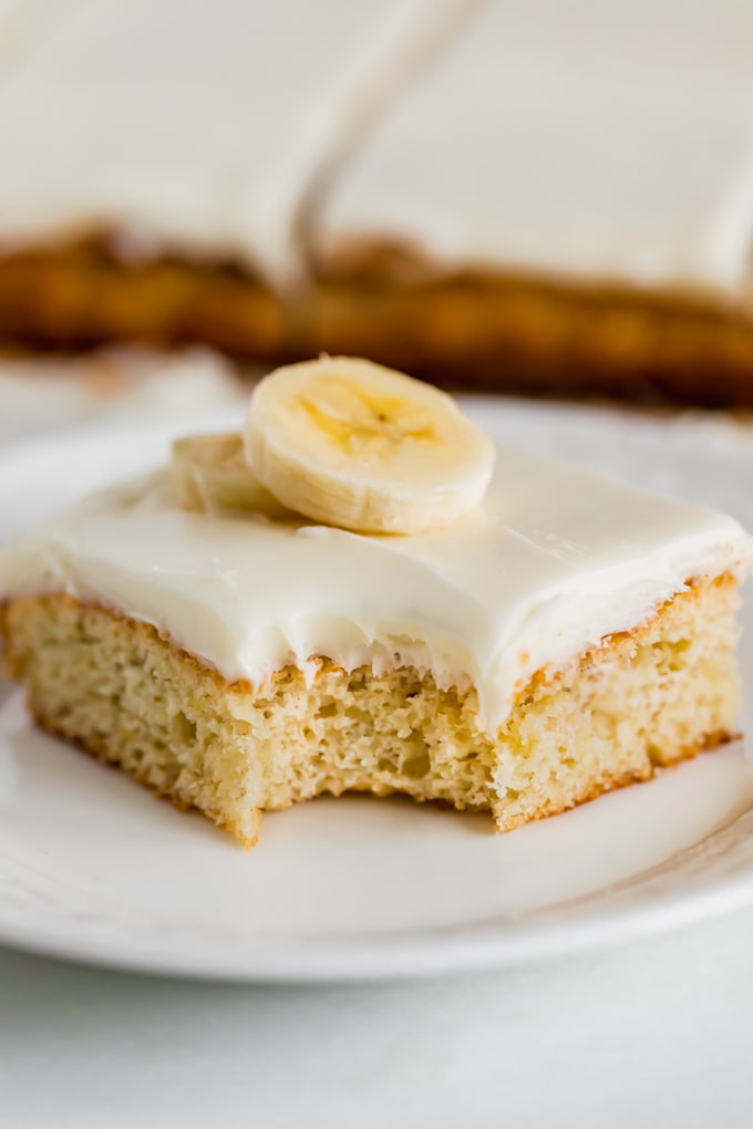 A close up image of . banana bar with a bite taken out of it.