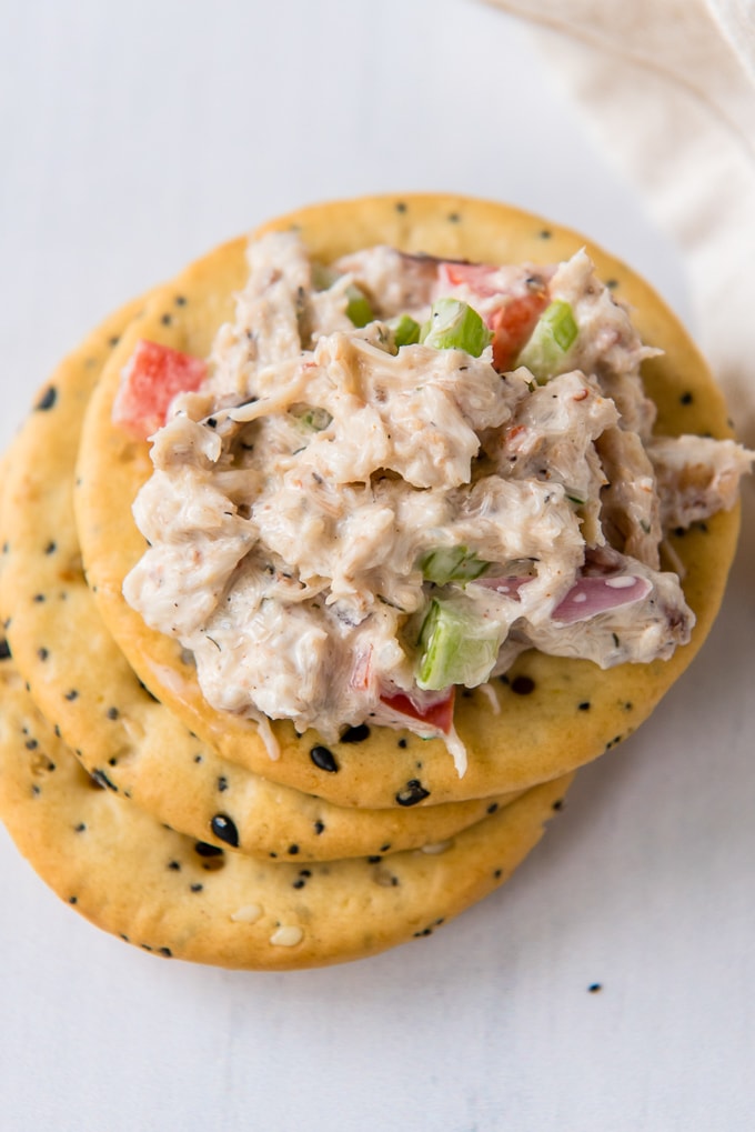 Crab salad on a stack of crackers.