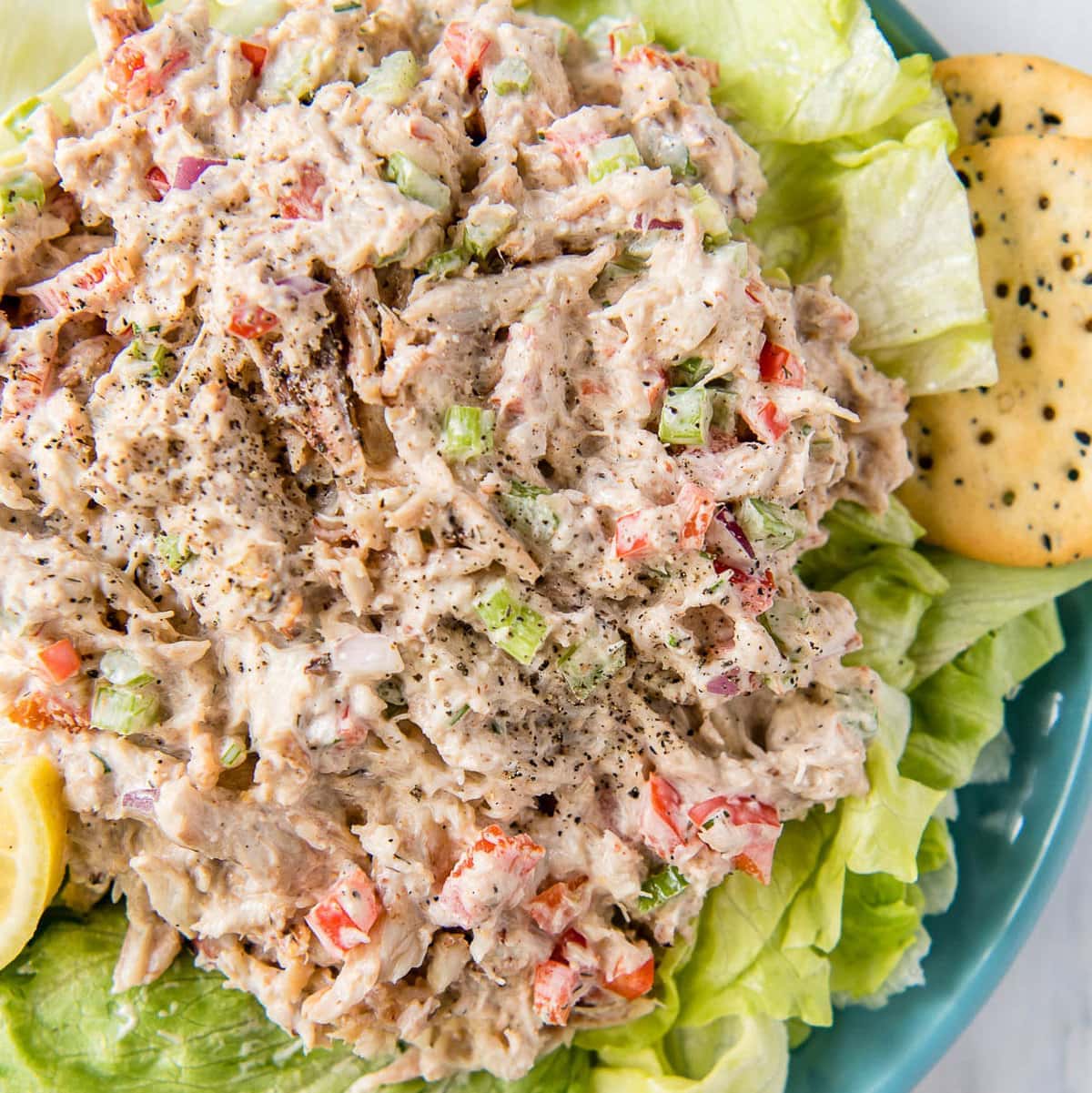 A close up of crab salad on lettuce