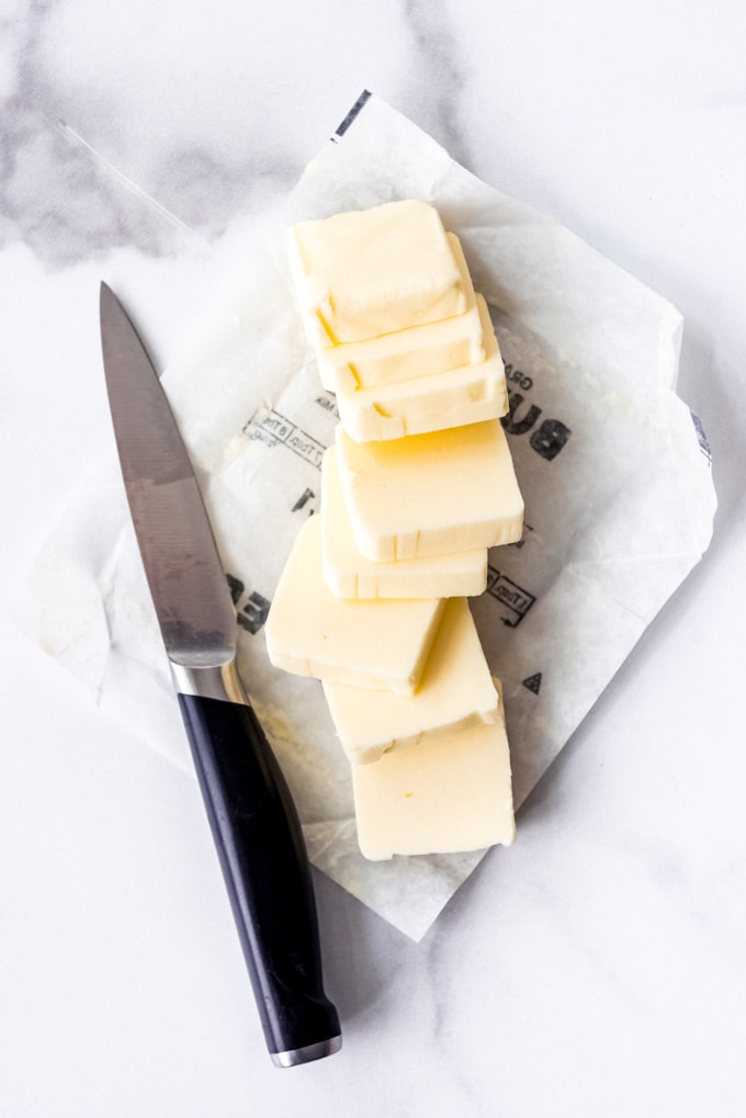 An image of a stick of butter cut into cubes.