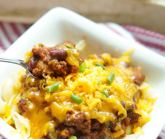Chili mac, with a some on a spoon lifted up